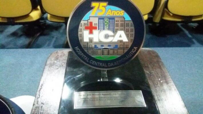 trofeu pelo primeiro lugar no concurso criacao de logo 75 anos hca Marcelo azevedo dos santos